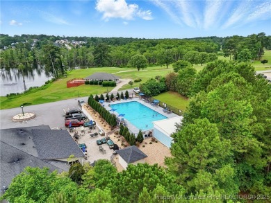 A beautifully updated brick home nestled on a peaceful corner on Kings Grant Golf and Country Club in North Carolina - for sale on GolfHomes.com, golf home, golf lot