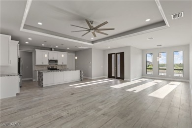 From the moment you step inside, you'll be impressed by the on Royal Tee Country Club in Florida - for sale on GolfHomes.com, golf home, golf lot