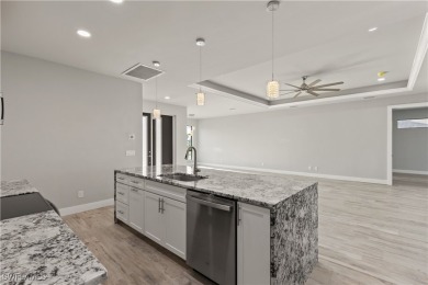 From the moment you step inside, you'll be impressed by the on Royal Tee Country Club in Florida - for sale on GolfHomes.com, golf home, golf lot