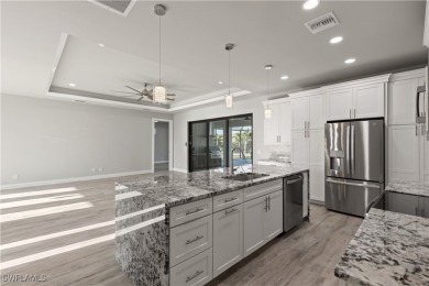 From the moment you step inside, you'll be impressed by the on Royal Tee Country Club in Florida - for sale on GolfHomes.com, golf home, golf lot