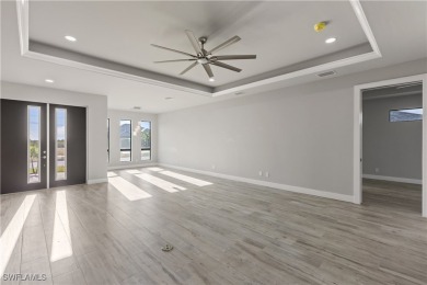 From the moment you step inside, you'll be impressed by the on Royal Tee Country Club in Florida - for sale on GolfHomes.com, golf home, golf lot