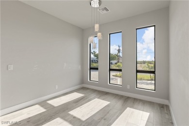 From the moment you step inside, you'll be impressed by the on Royal Tee Country Club in Florida - for sale on GolfHomes.com, golf home, golf lot