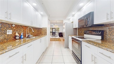 Step into this spacious first-floor unit in the highly on Flamingo Lakes Country Club in Florida - for sale on GolfHomes.com, golf home, golf lot