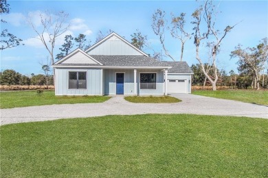 MOVE-IN READY NEW CONSTRUCTION, JUST IN TIME FOR THE SUMMER! NO on Sapelo Hammock Golf Club in Georgia - for sale on GolfHomes.com, golf home, golf lot