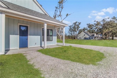 MOVE-IN READY NEW CONSTRUCTION, JUST IN TIME FOR THE SUMMER! NO on Sapelo Hammock Golf Club in Georgia - for sale on GolfHomes.com, golf home, golf lot