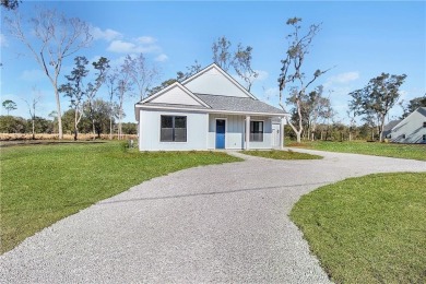 MOVE-IN READY NEW CONSTRUCTION, JUST IN TIME FOR THE SUMMER! NO on Sapelo Hammock Golf Club in Georgia - for sale on GolfHomes.com, golf home, golf lot