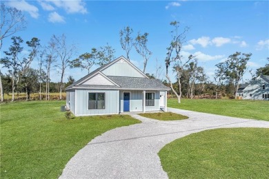 MOVE-IN READY NEW CONSTRUCTION, JUST IN TIME FOR THE SUMMER! NO on Sapelo Hammock Golf Club in Georgia - for sale on GolfHomes.com, golf home, golf lot