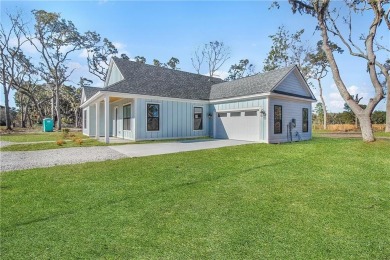MOVE-IN READY NEW CONSTRUCTION, JUST IN TIME FOR THE SUMMER! NO on Sapelo Hammock Golf Club in Georgia - for sale on GolfHomes.com, golf home, golf lot