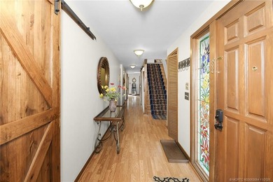 Welcome to this beautiful home featuring four bedrooms and three on Island Pines Golf Club in Florida - for sale on GolfHomes.com, golf home, golf lot