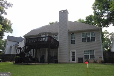 Welcome to this perfectly appointed 6 Bedroom / 4 Full Bathroom on Summergrove Golf Club in Georgia - for sale on GolfHomes.com, golf home, golf lot