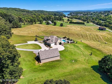 Discover your private sanctuary on 10 rolling acres with on Tellico Village -The Links At Kahite Golf Course in Tennessee - for sale on GolfHomes.com, golf home, golf lot