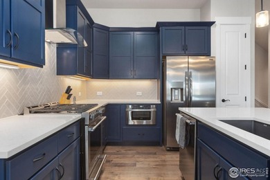 Luxury lock-and-leave living in the gated TPC golf course on TPC Colorado Golf Club in Colorado - for sale on GolfHomes.com, golf home, golf lot