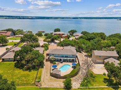 No cookie-cutter house here! Located on the 18th tee box in on De Cordova Bend Country Club in Texas - for sale on GolfHomes.com, golf home, golf lot