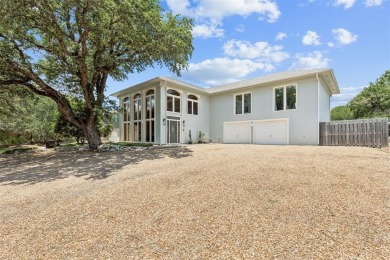 No cookie-cutter house here! Located on the 18th tee box in on De Cordova Bend Country Club in Texas - for sale on GolfHomes.com, golf home, golf lot