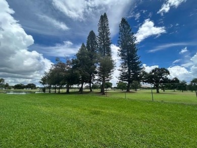 RARELY AVAILABLE first floor, corner unit in the quiet, sought on Grande Oaks Golf Club in Florida - for sale on GolfHomes.com, golf home, golf lot