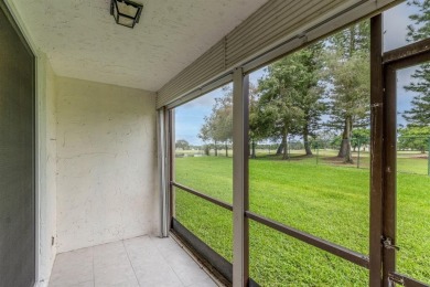 RARELY AVAILABLE first floor, corner unit in the quiet, sought on Grande Oaks Golf Club in Florida - for sale on GolfHomes.com, golf home, golf lot