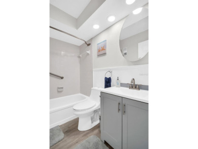 HUGE PRICE IMPROVEMENT! GORGEOUS two bed/two bath condo in the on Highland Lakes Executive Golf Course in Florida - for sale on GolfHomes.com, golf home, golf lot