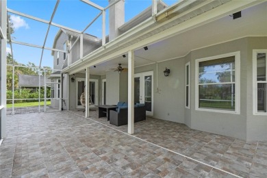 Welcome to this elegant Golf Course Home in Country Club Estates on Twin Rivers Golf Club in Florida - for sale on GolfHomes.com, golf home, golf lot