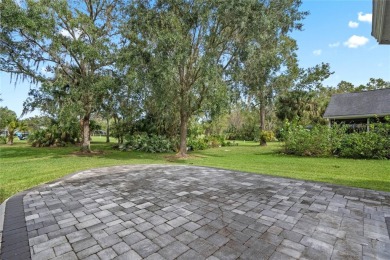 Welcome to this elegant Golf Course Home in Country Club Estates on Twin Rivers Golf Club in Florida - for sale on GolfHomes.com, golf home, golf lot