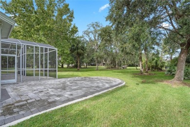 Welcome to this elegant Golf Course Home in Country Club Estates on Twin Rivers Golf Club in Florida - for sale on GolfHomes.com, golf home, golf lot