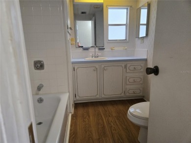 ZELLWOOD STATION 2 BEDROOM 2 BATH HOME. FEE SIMPLE, MEMBRANE on Zellwood Station Country Club in Florida - for sale on GolfHomes.com, golf home, golf lot