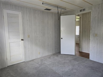 ZELLWOOD STATION 2 BEDROOM 2 BATH HOME. FEE SIMPLE, MEMBRANE on Zellwood Station Country Club in Florida - for sale on GolfHomes.com, golf home, golf lot