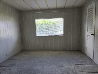 ZELLWOOD STATION 2 BEDROOM 2 BATH HOME. FEE SIMPLE, MEMBRANE on Zellwood Station Country Club in Florida - for sale on GolfHomes.com, golf home, golf lot