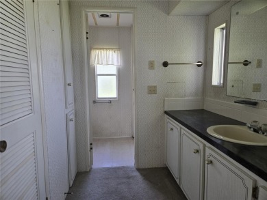 ZELLWOOD STATION 2 BEDROOM 2 BATH HOME. FEE SIMPLE, MEMBRANE on Zellwood Station Country Club in Florida - for sale on GolfHomes.com, golf home, golf lot