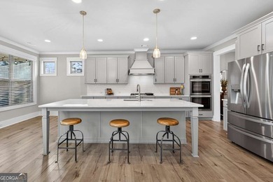 Stunning like-new 5 bedroom, 3.5 bath home in the highly on Traditions of Braselton Golf Club in Georgia - for sale on GolfHomes.com, golf home, golf lot