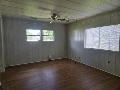 ZELLWOOD STATION 2 BEDROOM 2 BATH HOME. FEE SIMPLE, MEMBRANE on Zellwood Station Country Club in Florida - for sale on GolfHomes.com, golf home, golf lot