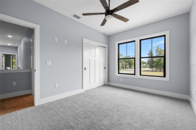 Stunning multi-generational 4-bedroom, 3.5-bathroom home in the on West End Golf Course in Florida - for sale on GolfHomes.com, golf home, golf lot