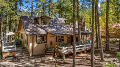 Escape to this adorable, remodeled 3 bedroom 2 bath cabin on Pinetop Lakes Country Club in Arizona - for sale on GolfHomes.com, golf home, golf lot