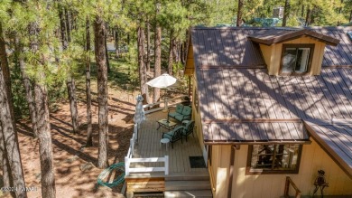 Escape to this adorable, remodeled 3 bedroom 2 bath cabin on Pinetop Lakes Country Club in Arizona - for sale on GolfHomes.com, golf home, golf lot