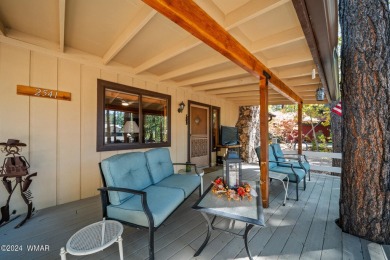 Escape to this adorable, remodeled 3 bedroom 2 bath cabin on Pinetop Lakes Country Club in Arizona - for sale on GolfHomes.com, golf home, golf lot