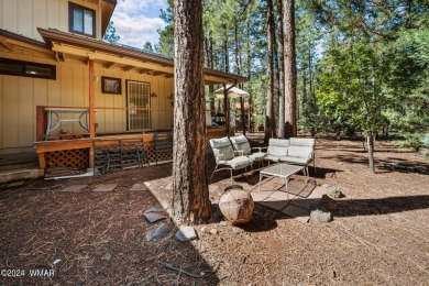 Escape to this adorable, remodeled 3 bedroom 2 bath cabin on Pinetop Lakes Country Club in Arizona - for sale on GolfHomes.com, golf home, golf lot