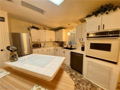 Beautiful Waterfront Home in Horizon Village! This stunning on Six Lakes Country Club in Florida - for sale on GolfHomes.com, golf home, golf lot