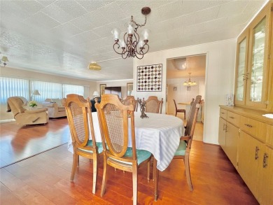 Nestled on a desirable corner lot in the serene back area of the on Fairway Village Golf Course in Florida - for sale on GolfHomes.com, golf home, golf lot