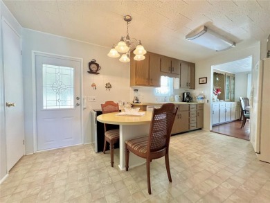 Nestled on a desirable corner lot in the serene back area of the on Fairway Village Golf Course in Florida - for sale on GolfHomes.com, golf home, golf lot