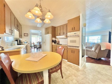 Nestled on a desirable corner lot in the serene back area of the on Fairway Village Golf Course in Florida - for sale on GolfHomes.com, golf home, golf lot