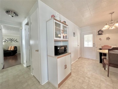 Nestled on a desirable corner lot in the serene back area of the on Fairway Village Golf Course in Florida - for sale on GolfHomes.com, golf home, golf lot