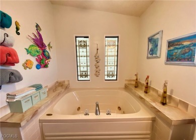 Beautiful Waterfront Home in Horizon Village! This stunning on Six Lakes Country Club in Florida - for sale on GolfHomes.com, golf home, golf lot