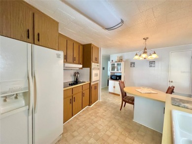 Nestled on a desirable corner lot in the serene back area of the on Fairway Village Golf Course in Florida - for sale on GolfHomes.com, golf home, golf lot
