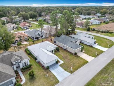 Discover the ultimate in Florida living in this beautiful on Royal Oaks Golf Club in Florida - for sale on GolfHomes.com, golf home, golf lot