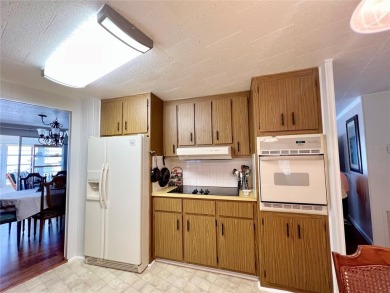Nestled on a desirable corner lot in the serene back area of the on Fairway Village Golf Course in Florida - for sale on GolfHomes.com, golf home, golf lot