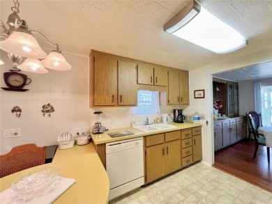 Nestled on a desirable corner lot in the serene back area of the on Fairway Village Golf Course in Florida - for sale on GolfHomes.com, golf home, golf lot