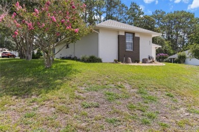 Discover the essence of Florida living in this beautifully on Twisted Oaks Golf Club in Florida - for sale on GolfHomes.com, golf home, golf lot