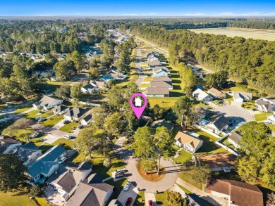 Get ready to live the coastal dream at 6623 Cherry Laurel Dr in on Heron Point Golf Club in South Carolina - for sale on GolfHomes.com, golf home, golf lot