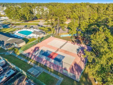 Get ready to live the coastal dream at 6623 Cherry Laurel Dr in on Heron Point Golf Club in South Carolina - for sale on GolfHomes.com, golf home, golf lot