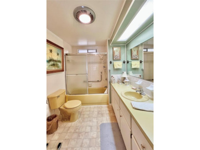 Nestled on a desirable corner lot in the serene back area of the on Fairway Village Golf Course in Florida - for sale on GolfHomes.com, golf home, golf lot
