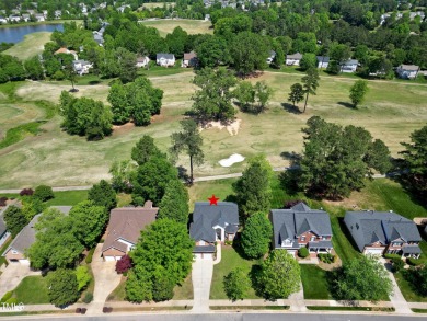 Welcome home to this sanctuary nestled alongside the green on Eagle Ridge Golf Course in North Carolina - for sale on GolfHomes.com, golf home, golf lot